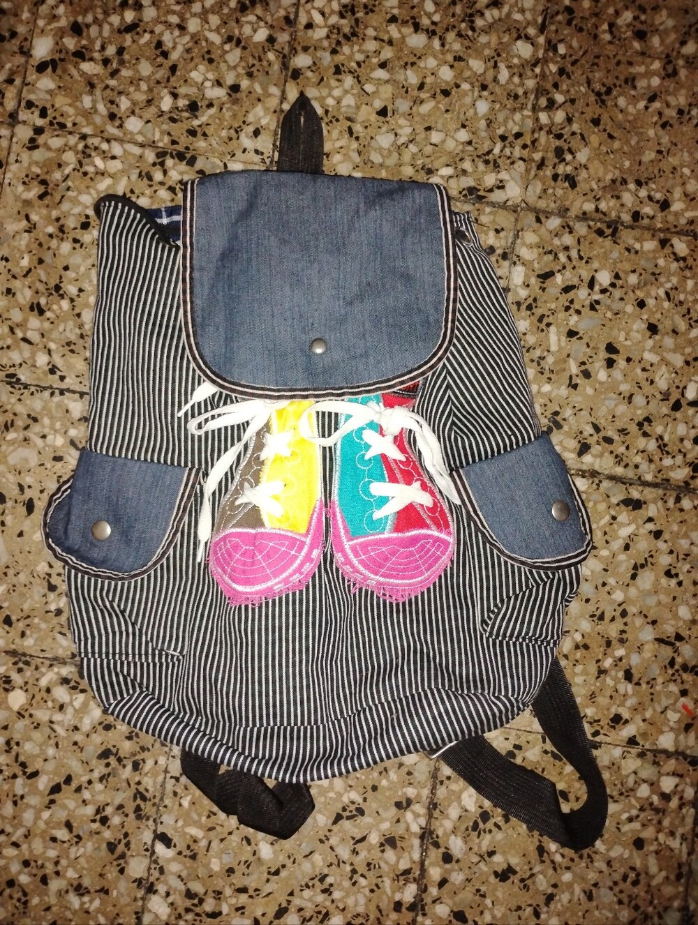 Striped Denim Accent Women’s Backpack with Colorful Sneaker Detail
